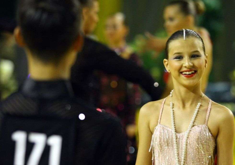  Ponad 250 par tanecznych spotkalo sie w weekend w Zamościu na turnieju o Grand Prix Polski Tanca Towarzyskiego. Podczas dwudniowej imprezy pary prezentowaly sie w tancach standardowych i latynoamerykanskich. 
