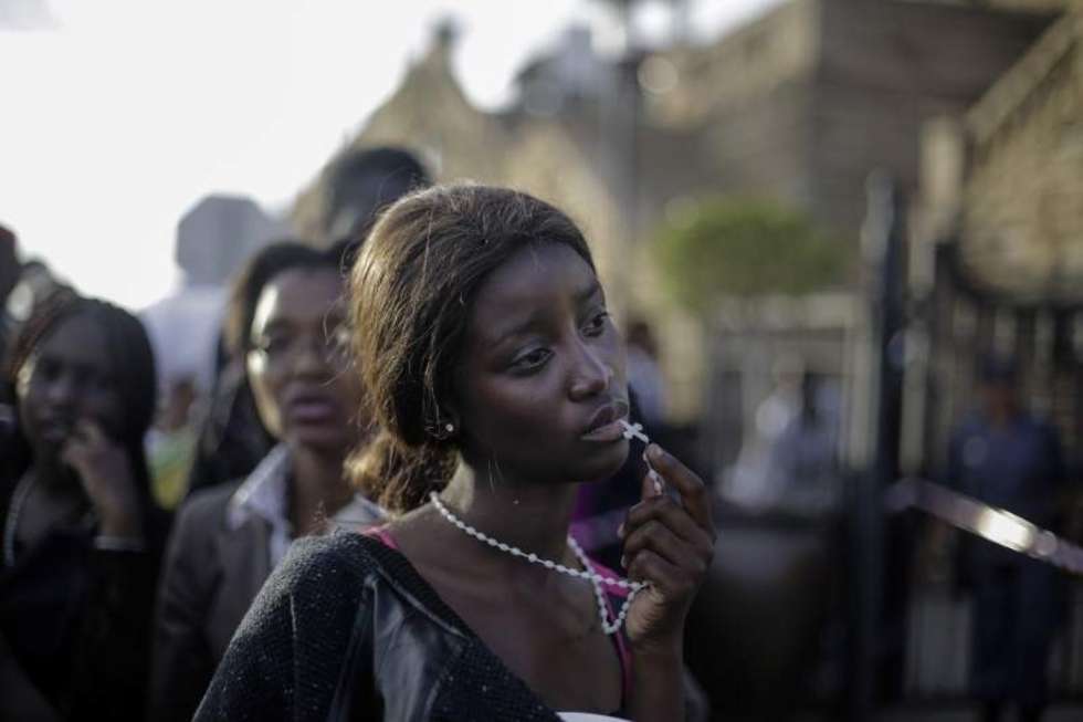  1st Prize People &#8211; Observed Portraits Single    13 December 2013, Pretoria, South Africa  A woman reacts in disappointment after access to see former South Africa Presi-dent Nelson Mandela was closed on the third and final day of his casket lying in state, outside Union Buildings in Pretoria, South Africa.