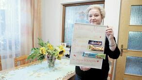 Jeden z prezentów, który od dzieci otrzymała Małgorzata Dydo. Dzieci przygotowały specjalną laurkę z napisem: Kochana Mamo czas spędzony z Tobą zawsze jest Bajeczny (do kartki przykleiły batonik o tej nazwie). Jesteś dzielna jak Lion (kolejny przyczepiony do kartki batonik) i słodka jak Princessa (kolejny czekoladowy wafelek). Za wszystko dziękujemy. Daniel, Jagoda, Ania.