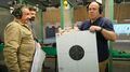 Bartłomiej Kseniak zawodnik KS SNAJPER (z tarczą) - zwycięzca w dwóch kategoriach pistoletowych.